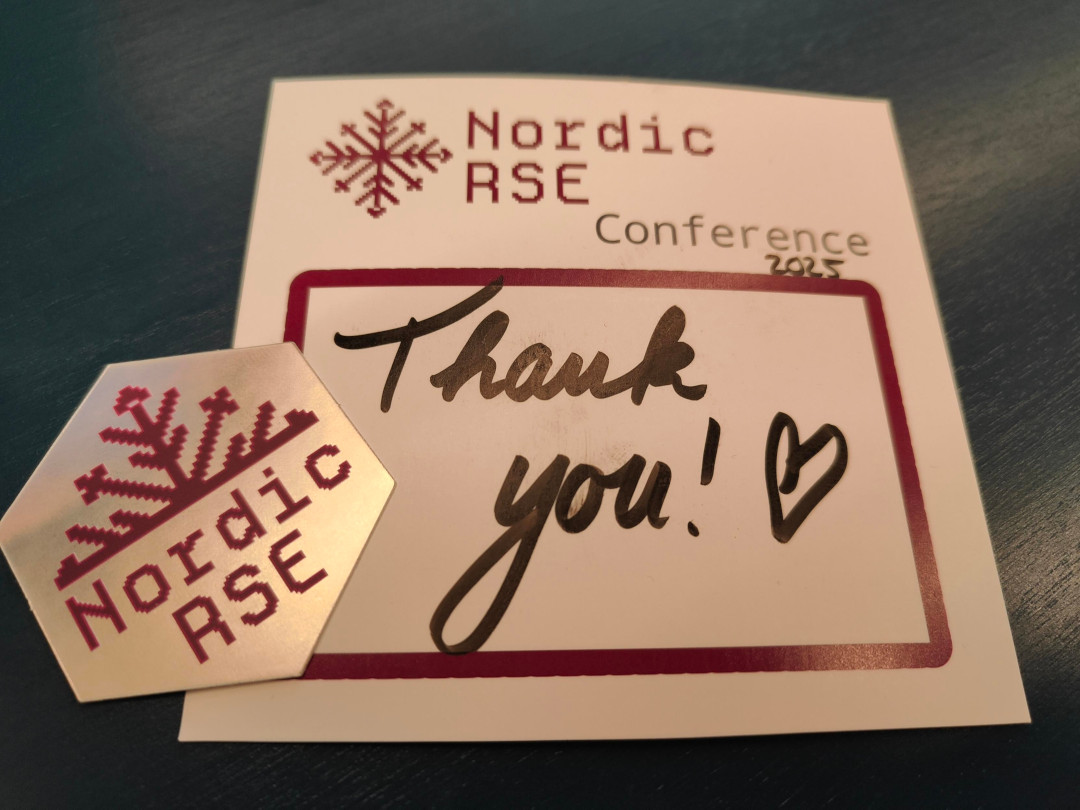 A conference badge saying Thank You